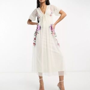 ASOS DESIGN embroidered short sleeve midi dress with textured mesh in ivory
